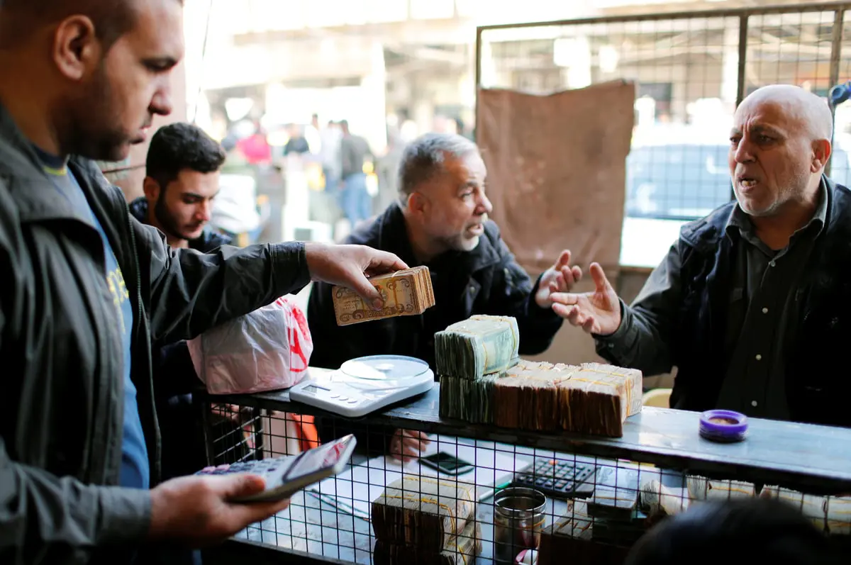 العراق.. ضوابط مصرفية تحاصر تهريب الدولار لإيران
