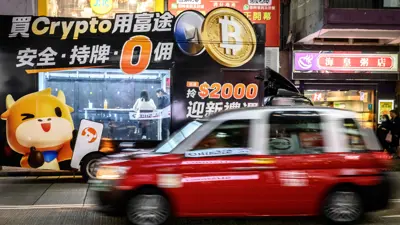 شاحنة لتبادل العملات المشفرة تحمل شعاري «بيتكوين» و«إيثريوم» في هونغ كونغ، يوم 27 نوفمبر 2024.