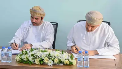خلال توقيع اتفاقية التمويل بين بنك «قطر الوطني- عُمان» و«كروة للسيارات».