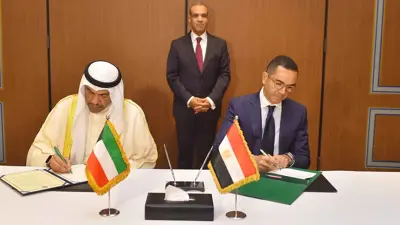 خلال توقيع الاتفاق بين وزير الاستثمار والتجارة الخارجية حسن الخطيب ووزير الخارجية الكويتي عبد الله اليحيا