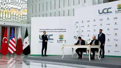 جانب من توقيع سوريا اتفاق مع تحالف شركات لإقامة مشروعات كبرى لتوليد الكهرباء بحضور الرئيس السوري أحمد الشرع، 29 مايو 2025.